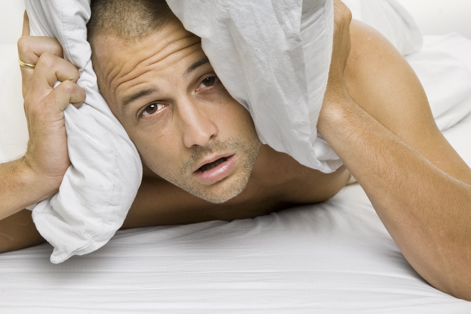 bigstock-man-in-bed-6546651